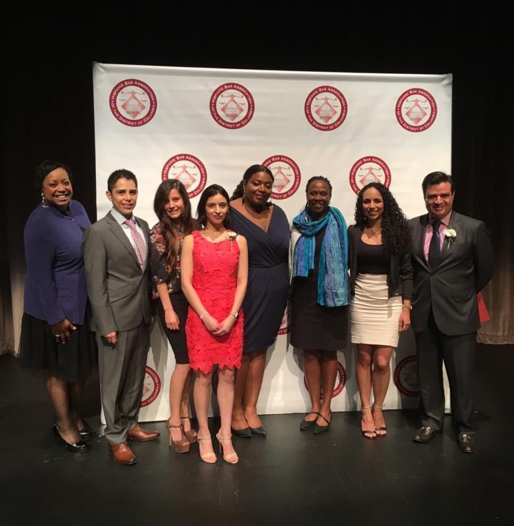 AUWCL graduates with Dean Camille Nelson and Senior Director Kenrdra Brown 